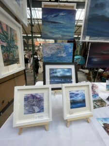 Paintings at the St George Market by local artist Karolina